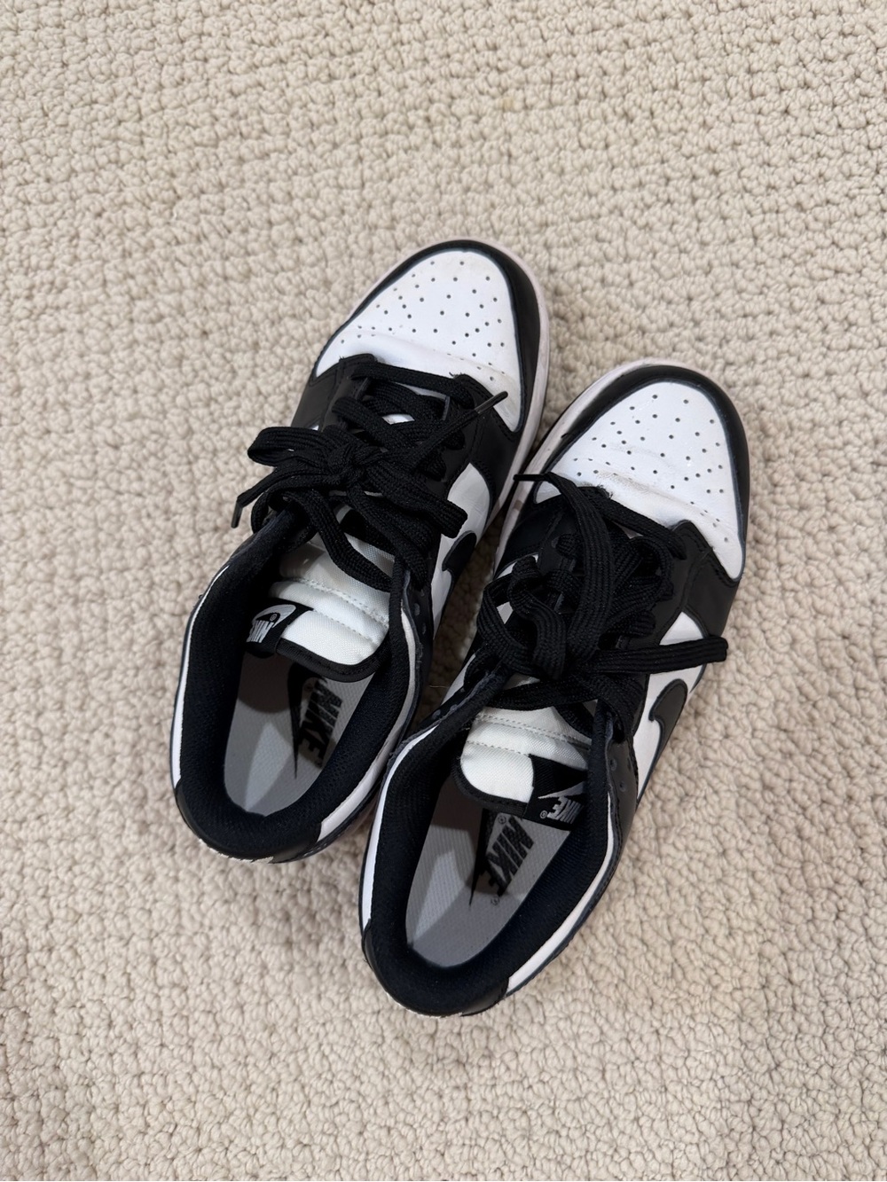 Nike Black and White Low-Top Sneakers with Pink Accent Nail
